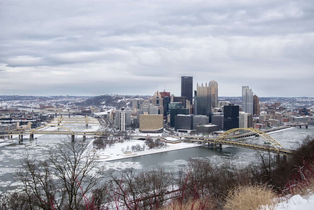 a landscape of Pittsburgh covered in snow
